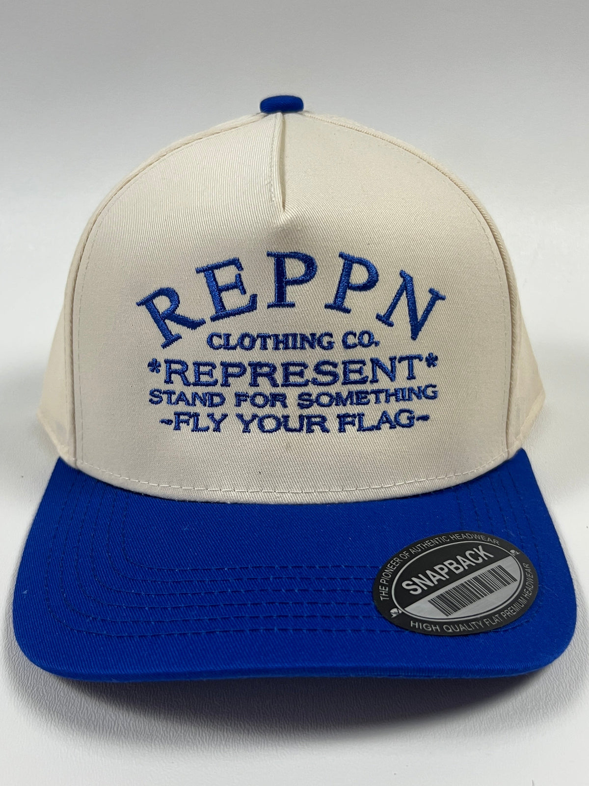 REPPN SnapBack Embroidered Hat - Cream/Royal Blue
