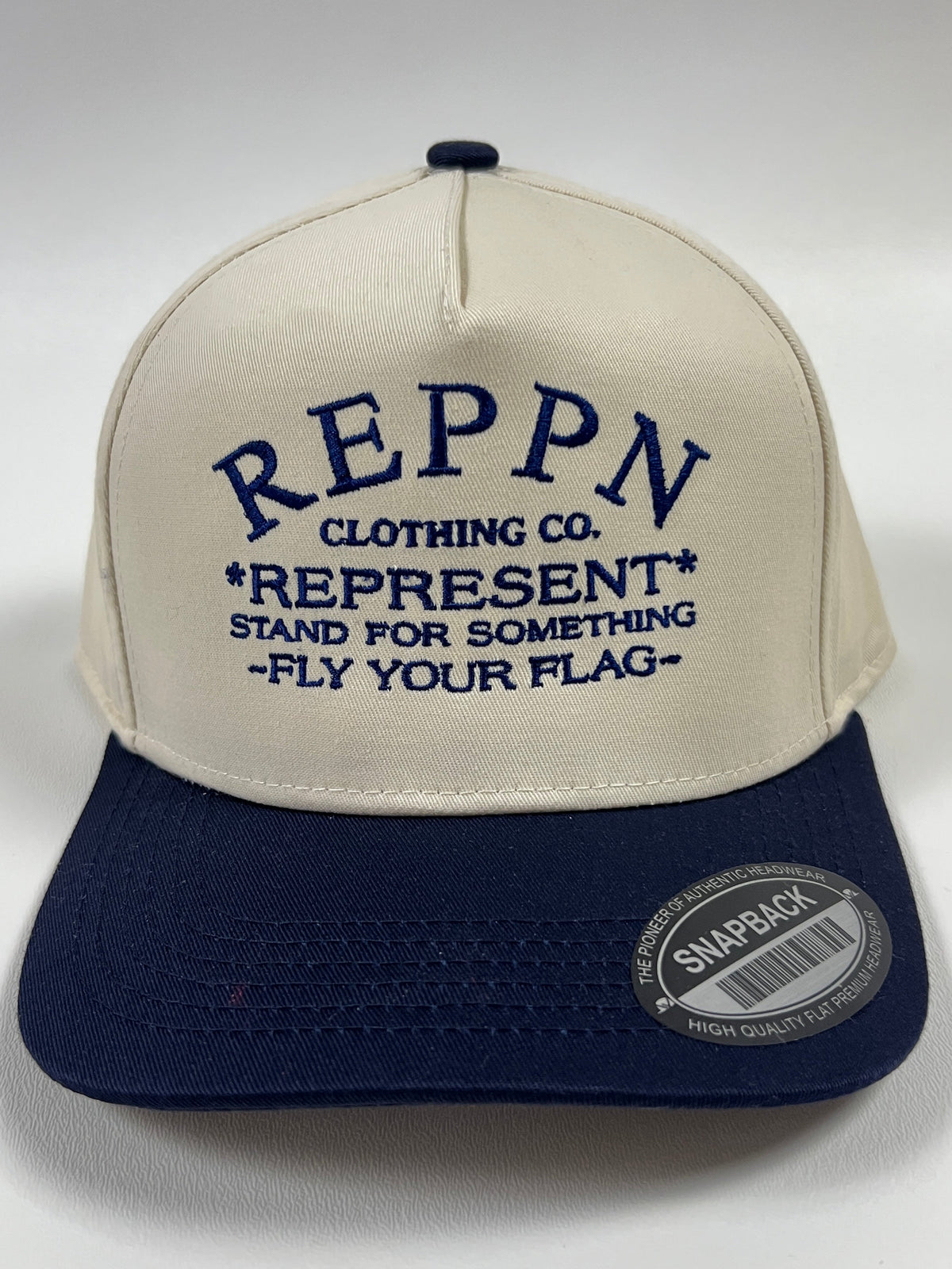 REPPN SnapBack Embroidered Hat - Cream/Navy Blue